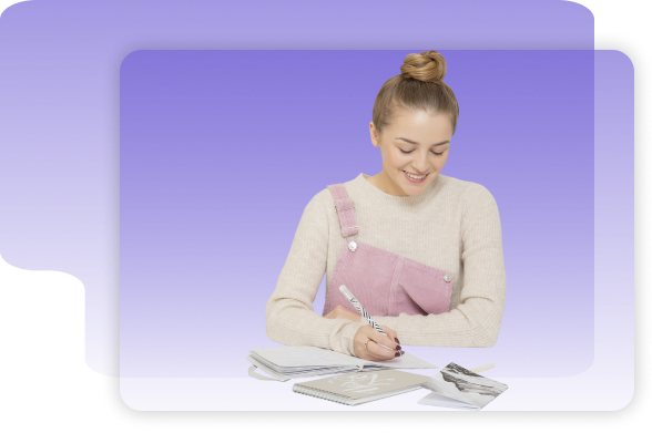 person smiling and doing homework