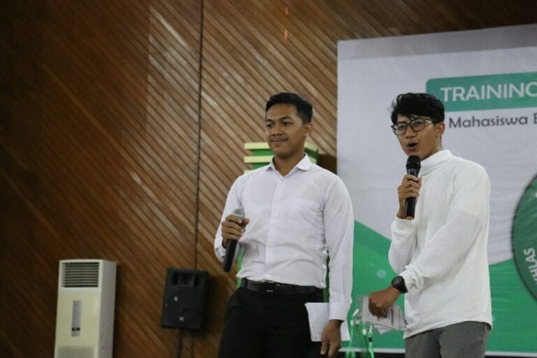 a couple of men holding microphones