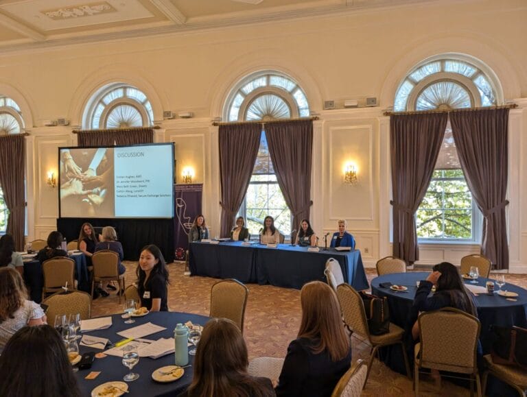 Caitlyn Wang speaking at the University of Pittsburg on the Women of the Cloud college tour.